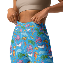 Load image into Gallery viewer, Closeup of the vibrant Happiest Ocean leggings design with colorful sea creatures, perfect for water sports