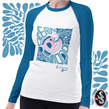 Load image into Gallery viewer, Front view of women's Ocean Mood rash guard featuring a pink angler fish and fun typography, available in regular and plus sizes
