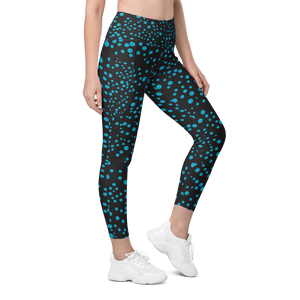 Side view of Beautiful Bioluminescence Pocket Leggings with two pockets
