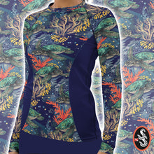 Load image into Gallery viewer, Turtle Reef Twilight rash guard with sea turtle reef print on ocean-inspired background